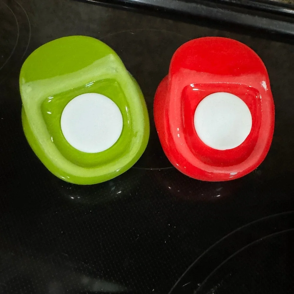 The Super Mario Bros. Salt & pepper shakers Mario & Luigi Hats set by Geek Fuel.